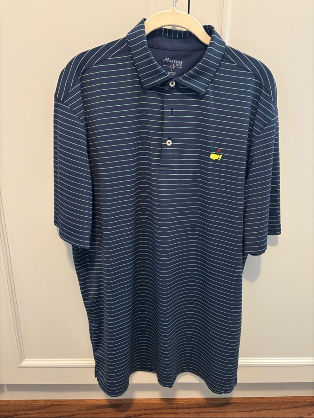 Masters Tech Navy Striped Polo with Yellow Emblem